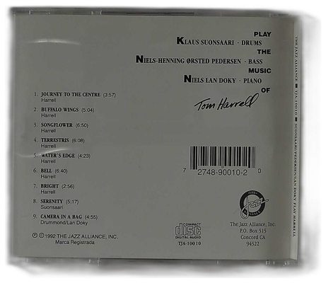 TOM HARRELL